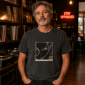 Man wearing the Turntable original art T-shirt in a Stay Offended record shop